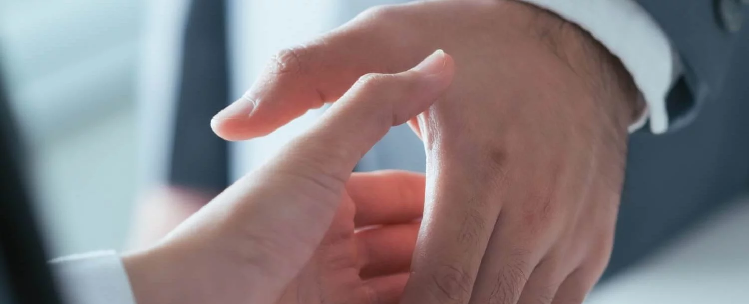 two men going in for a handshake