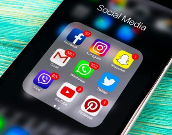 various social media apps on smartphone with notifications