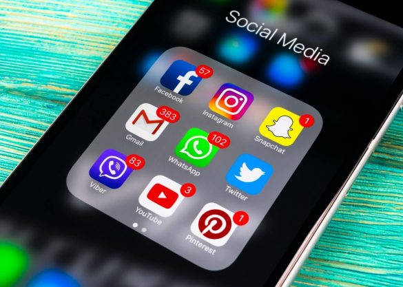 various social media apps on smartphone with notifications